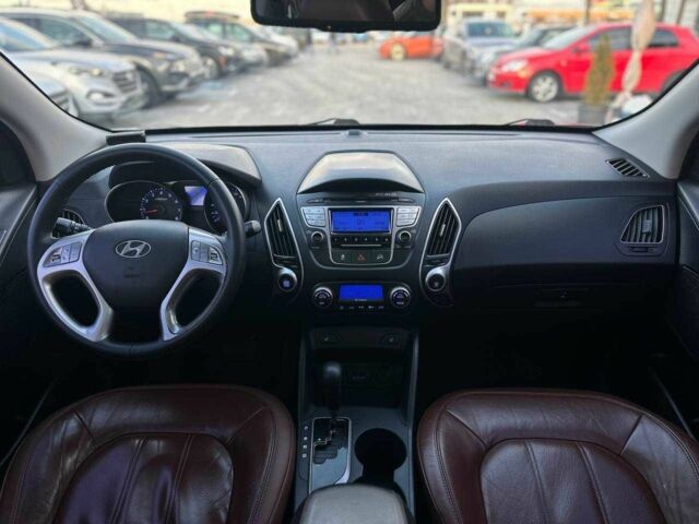 Серый Хендай Туксон, объемом двигателя 2.4 л и пробегом 150 тыс. км за 12990 $, фото 19 на Automoto.ua