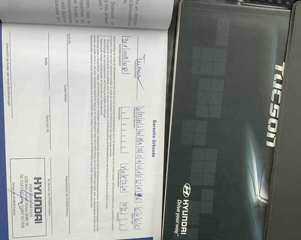 Серый Хендай Туксон, объемом двигателя 1.98 л и пробегом 117 тыс. км за 10350 $, фото 36 на Automoto.ua