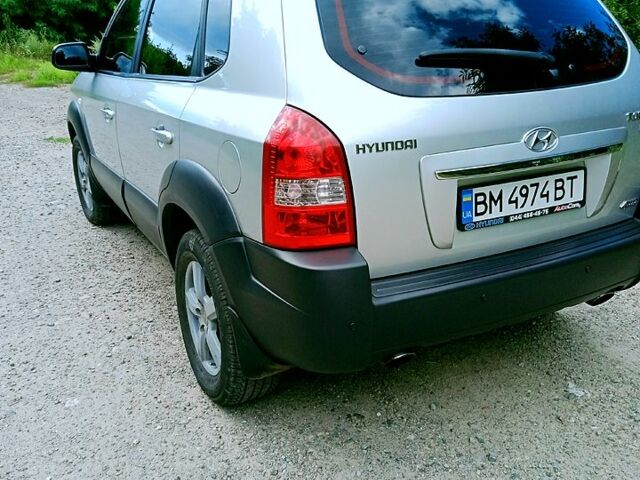 Сірий Хендай Туксон, об'ємом двигуна 2 л та пробігом 181 тис. км за 9900 $, фото 4 на Automoto.ua