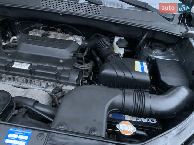 Серый Хендай Туксон, объемом двигателя 1.98 л и пробегом 117 тыс. км за 10350 $, фото 29 на Automoto.ua