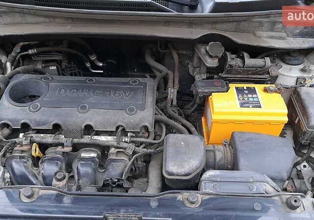 Серый Хендай Туксон, объемом двигателя 2.4 л и пробегом 115 тыс. км за 11200 $, фото 7 на Automoto.ua