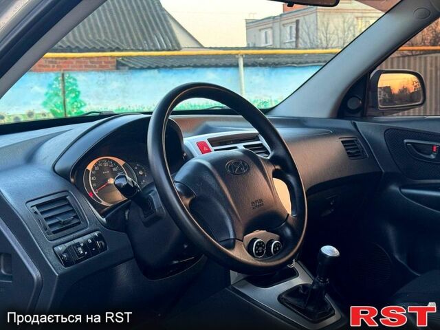 Серый Хендай Туксон, объемом двигателя 20 л и пробегом 162 тыс. км за 8450 $, фото 7 на Automoto.ua