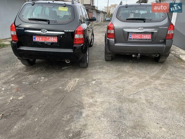 Серый Хендай Туксон, объемом двигателя 1.98 л и пробегом 117 тыс. км за 10350 $, фото 7 на Automoto.ua