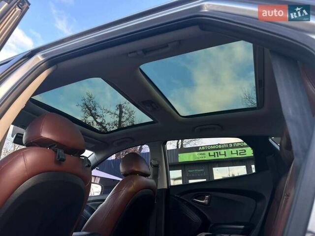 Серый Хендай Туксон, объемом двигателя 2.36 л и пробегом 150 тыс. км за 12990 $, фото 21 на Automoto.ua