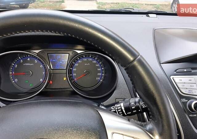 Серый Хендай Туксон, объемом двигателя 2.4 л и пробегом 115 тыс. км за 11200 $, фото 3 на Automoto.ua