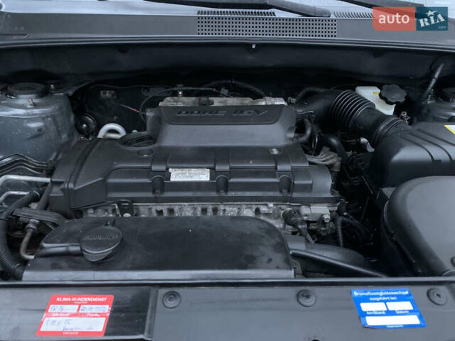 Серый Хендай Туксон, объемом двигателя 1.98 л и пробегом 117 тыс. км за 10350 $, фото 31 на Automoto.ua