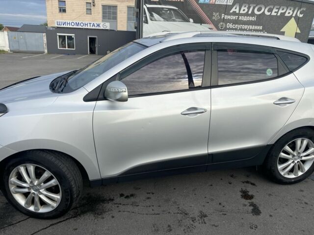 Сірий Хендай Туксон, об'ємом двигуна 2 л та пробігом 206 тис. км за 11500 $, фото 7 на Automoto.ua