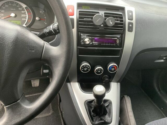 Сірий Хендай Туксон, об'ємом двигуна 2 л та пробігом 117 тис. км за 10350 $, фото 6 на Automoto.ua