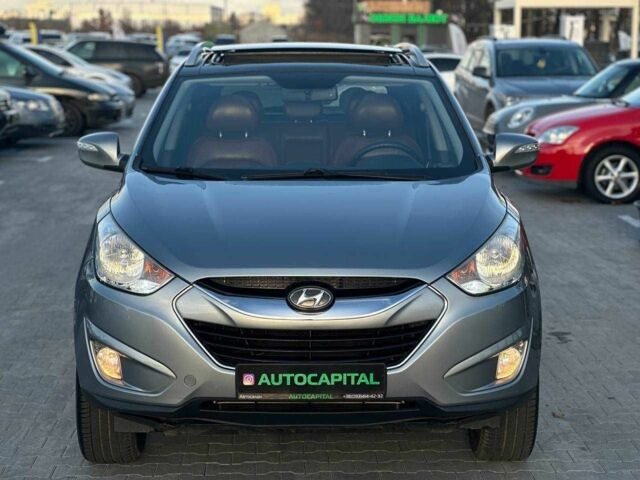 Серый Хендай Туксон, объемом двигателя 2.4 л и пробегом 150 тыс. км за 12990 $, фото 3 на Automoto.ua