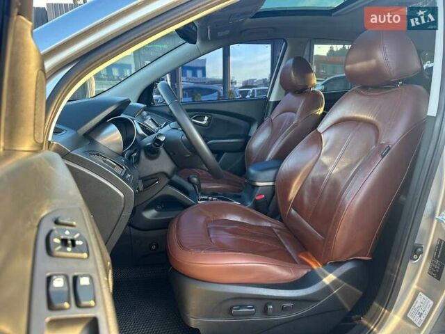 Серый Хендай Туксон, объемом двигателя 2.36 л и пробегом 150 тыс. км за 12990 $, фото 14 на Automoto.ua