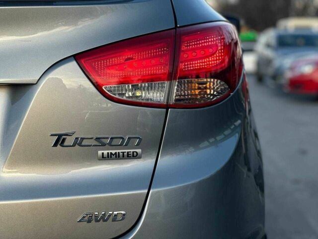 Серый Хендай Туксон, объемом двигателя 2.4 л и пробегом 150 тыс. км за 12990 $, фото 8 на Automoto.ua