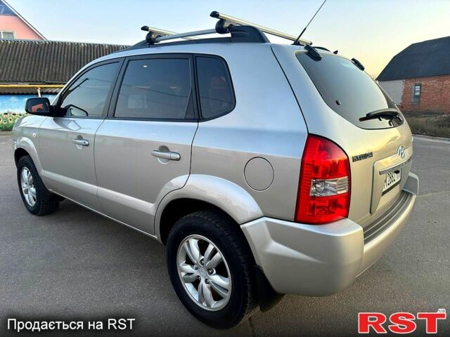 Серый Хендай Туксон, объемом двигателя 20 л и пробегом 162 тыс. км за 8450 $, фото 5 на Automoto.ua