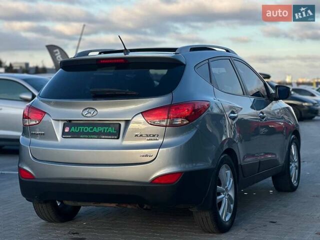 Серый Хендай Туксон, объемом двигателя 2.36 л и пробегом 150 тыс. км за 12990 $, фото 7 на Automoto.ua