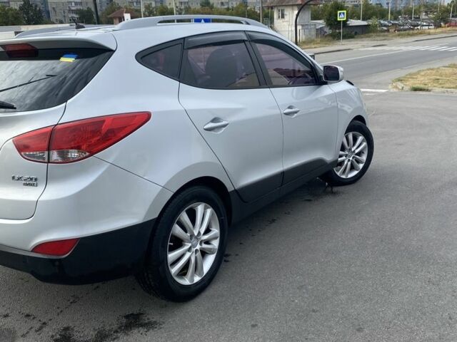 Сірий Хендай Туксон, об'ємом двигуна 2 л та пробігом 206 тис. км за 11500 $, фото 8 на Automoto.ua