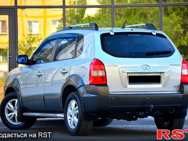 Сірий Хендай Туксон, об'ємом двигуна 2 л та пробігом 152 тис. км за 8800 $, фото 2 на Automoto.ua