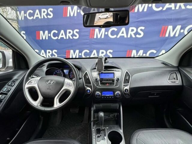 Серый Хендай Туксон, объемом двигателя 2.4 л и пробегом 196 тыс. км за 12900 $, фото 6 на Automoto.ua