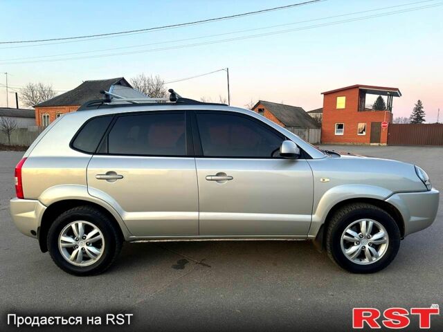 Серый Хендай Туксон, объемом двигателя 20 л и пробегом 162 тыс. км за 8450 $, фото 4 на Automoto.ua