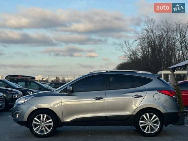 Серый Хендай Туксон, объемом двигателя 2.36 л и пробегом 150 тыс. км за 12990 $, фото 6 на Automoto.ua