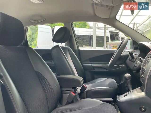 Сірий Хендай Туксон, об'ємом двигуна 2 л та пробігом 240 тис. км за 10790 $, фото 21 на Automoto.ua