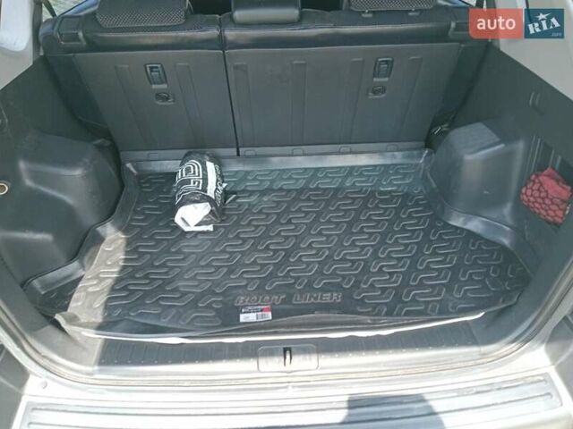 Серый Хендай Туксон, объемом двигателя 1.98 л и пробегом 131 тыс. км за 10650 $, фото 10 на Automoto.ua