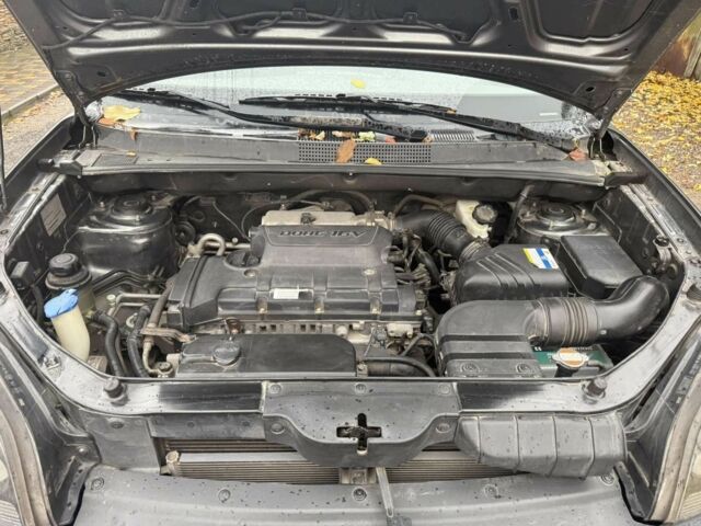 Серый Хендай Туксон, объемом двигателя 2 л и пробегом 43 тыс. км за 8500 $, фото 17 на Automoto.ua