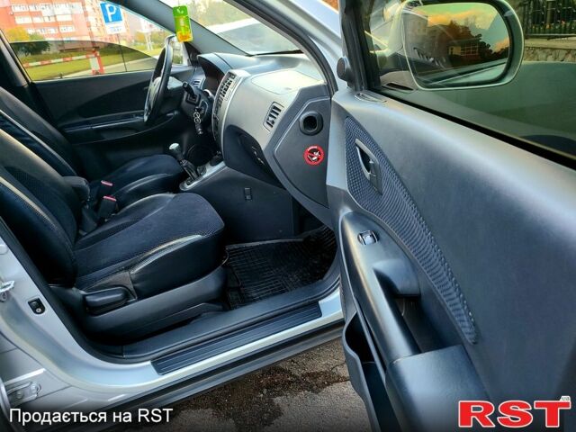 Сірий Хендай Туксон, об'ємом двигуна 2 л та пробігом 147 тис. км за 9800 $, фото 9 на Automoto.ua