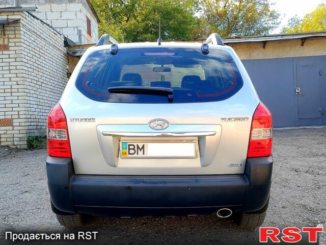 Сірий Хендай Туксон, об'ємом двигуна 2 л та пробігом 147 тис. км за 9800 $, фото 12 на Automoto.ua