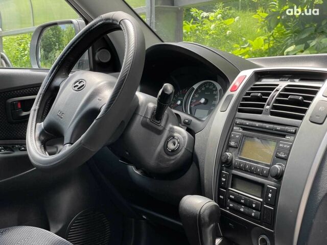 Серый Хендай Туксон, объемом двигателя 2 л и пробегом 240 тыс. км за 10990 $, фото 23 на Automoto.ua