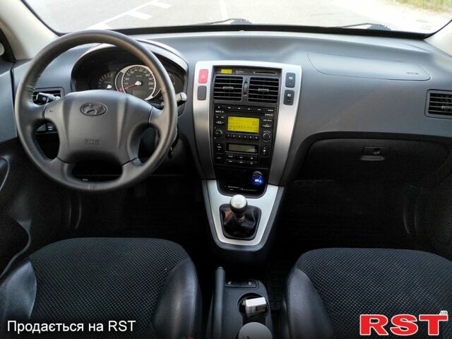 Серый Хендай Туксон, объемом двигателя 2 л и пробегом 263 тыс. км за 8800 $, фото 8 на Automoto.ua