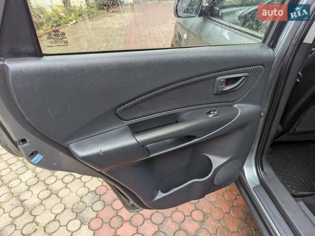 Сірий Хендай Туксон, об'ємом двигуна 1.98 л та пробігом 209 тис. км за 8700 $, фото 19 на Automoto.ua