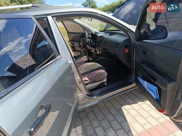 Сірий Хендай Туксон, об'ємом двигуна 2 л та пробігом 159 тис. км за 8800 $, фото 34 на Automoto.ua