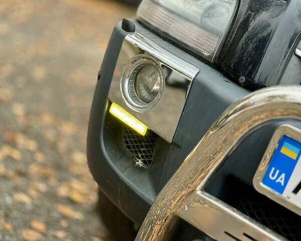 Серый Хендай Туксон, объемом двигателя 2 л и пробегом 92 тыс. км за 10500 $, фото 7 на Automoto.ua