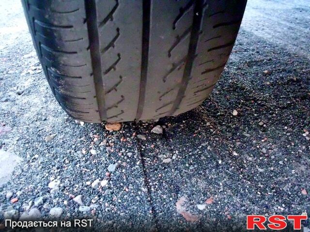 Серый Хендай Туксон, объемом двигателя 2 л и пробегом 370 тыс. км за 13300 $, фото 7 на Automoto.ua