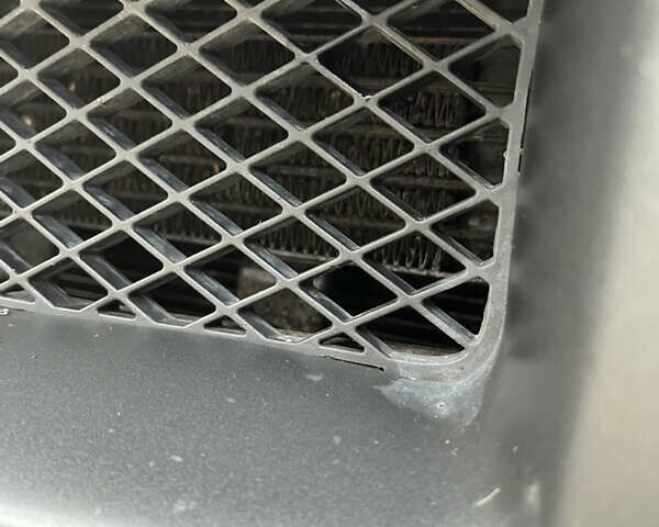 Серый Хендай Туксон, объемом двигателя 1.99 л и пробегом 209 тыс. км за 8200 $, фото 21 на Automoto.ua