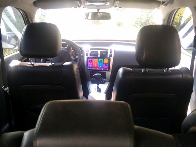 Серый Хендай Туксон, объемом двигателя 2 л и пробегом 102 тыс. км за 10200 $, фото 2 на Automoto.ua