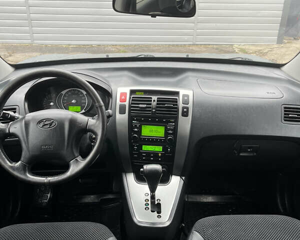 Серый Хендай Туксон, объемом двигателя 1.99 л и пробегом 209 тыс. км за 8200 $, фото 17 на Automoto.ua