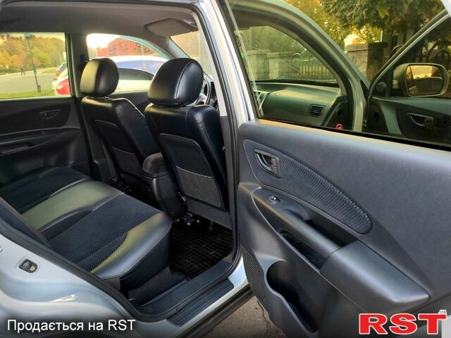 Сірий Хендай Туксон, об'ємом двигуна 2 л та пробігом 147 тис. км за 9800 $, фото 10 на Automoto.ua