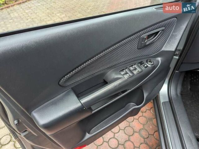 Сірий Хендай Туксон, об'ємом двигуна 1.98 л та пробігом 209 тис. км за 8700 $, фото 18 на Automoto.ua