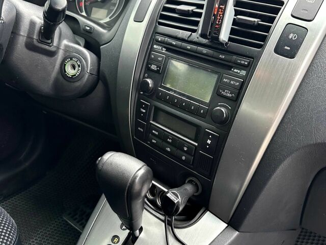 Серый Хендай Туксон, объемом двигателя 2 л и пробегом 150 тыс. км за 9900 $, фото 1 на Automoto.ua