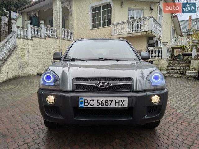 Сірий Хендай Туксон, об'ємом двигуна 1.98 л та пробігом 209 тис. км за 8700 $, фото 6 на Automoto.ua