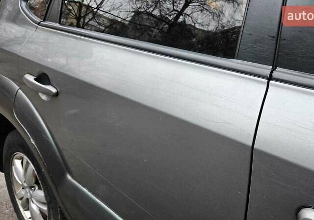 Сірий Хендай Туксон, об'ємом двигуна 1.98 л та пробігом 397 тис. км за 5800 $, фото 14 на Automoto.ua