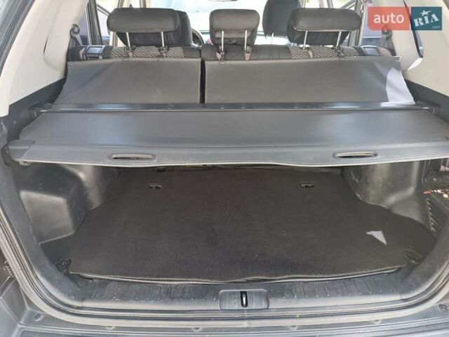 Сірий Хендай Туксон, об'ємом двигуна 2 л та пробігом 159 тис. км за 8800 $, фото 32 на Automoto.ua