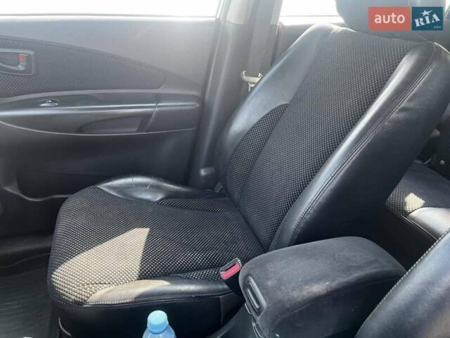 Серый Хендай Туксон, объемом двигателя 1.98 л и пробегом 373 тыс. км за 6800 $, фото 11 на Automoto.ua