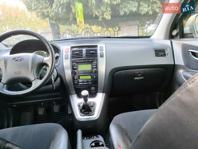 Хендай Туксон 2011 в Сумах на Automoto.ua Серый Хендай Туксон, объемом двигателя 2 л и пробегом 147 тыс. км за 9800 $, фото 12 на Automoto.ua