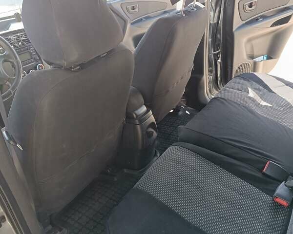 Сірий Хендай Туксон, об'ємом двигуна 2 л та пробігом 159 тис. км за 8800 $, фото 30 на Automoto.ua