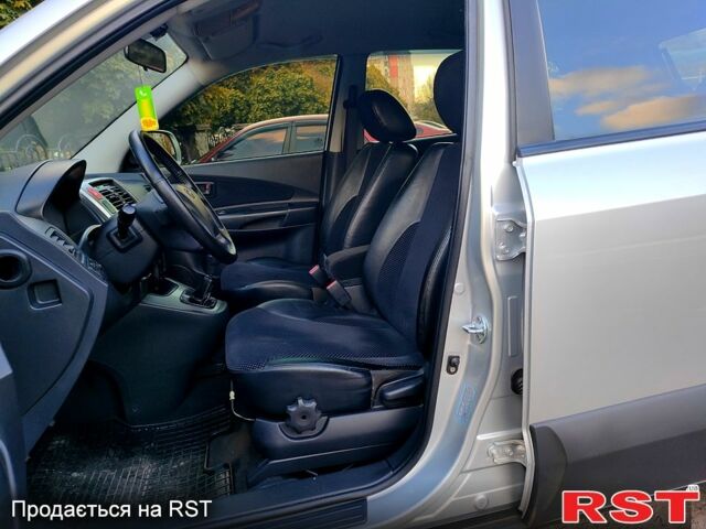 Сірий Хендай Туксон, об'ємом двигуна 2 л та пробігом 147 тис. км за 9800 $, фото 3 на Automoto.ua