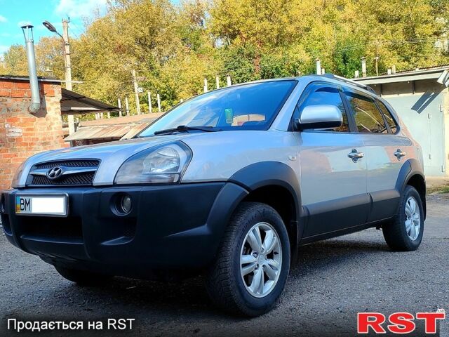 Сірий Хендай Туксон, об'ємом двигуна 2 л та пробігом 147 тис. км за 9800 $, фото 13 на Automoto.ua