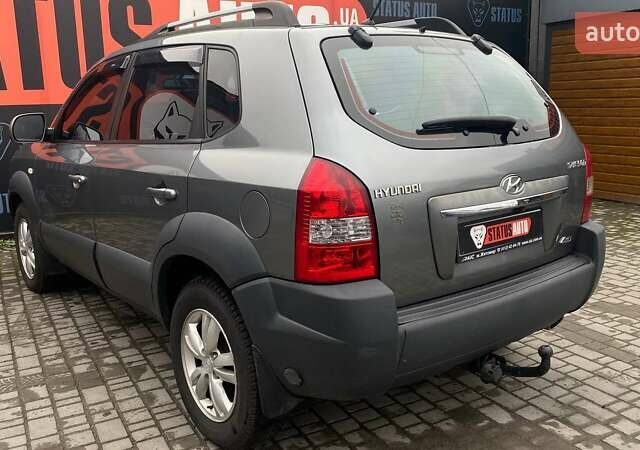Серый Хендай Туксон, объемом двигателя 1.98 л и пробегом 174 тыс. км за 9500 $, фото 8 на Automoto.ua