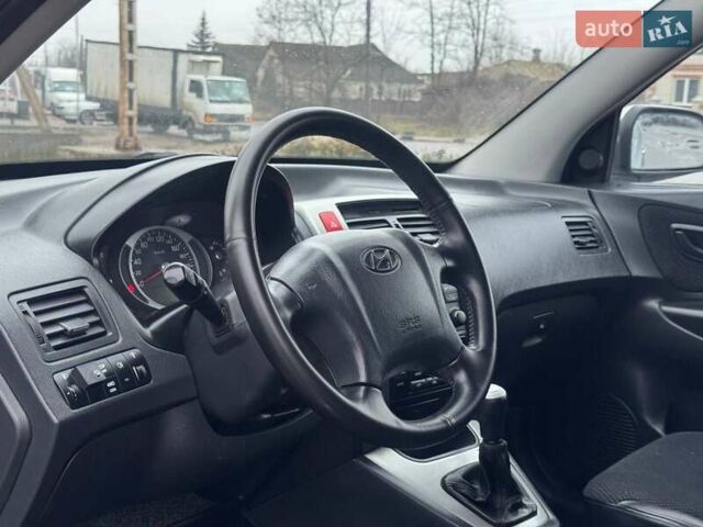 Сірий Хендай Туксон, об'ємом двигуна 1.98 л та пробігом 149 тис. км за 9650 $, фото 37 на Automoto.ua