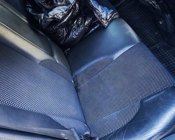 Серый Хендай Туксон, объемом двигателя 2 л и пробегом 255 тыс. км за 9500 $, фото 1 на Automoto.ua